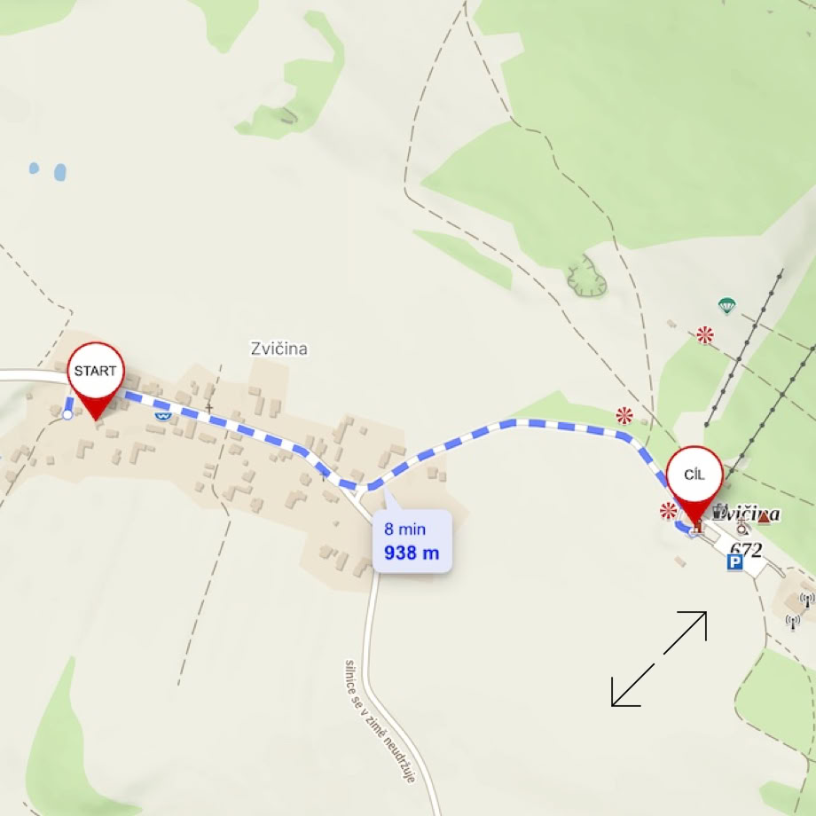 A picturesque A-frame wooden cabin set amidst lush mountains and blue skies.